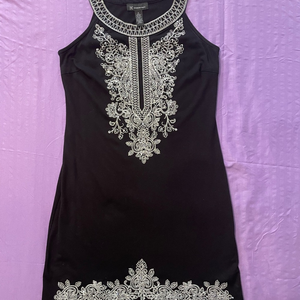 Cute mini dress by INC size medium black with silver embroidery.